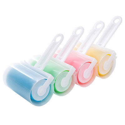 สีน้ําเงินสัตว์เลี้ยงกําจัดผม Lint Roller กับแผ่นที่ติดต่อที่สามารถนําไปใช้ใหม่และปิดสามารถล้าง
