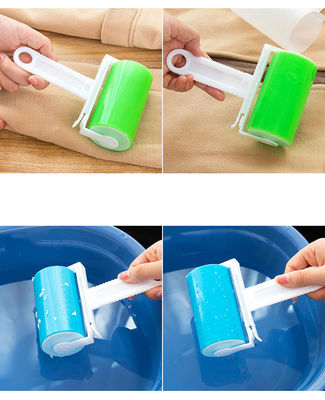 สีน้ําเงินสัตว์เลี้ยงกําจัดผม Lint Roller กับแผ่นที่ติดต่อที่สามารถนําไปใช้ใหม่และปิดสามารถล้าง
