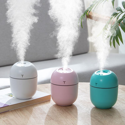 เครื่องปรับความชื้นอากาศแบบพกพาด้วยเสียงฉีด ultrasonic ขนาด 220 มิลลิตร พร้อมโคมไฟกลางคืน LED และเครื่องกระจายกลิ่น USB